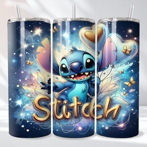 May include: A set of three stainless steel tumblers with a vibrant design featuring the character Stitch from Lilo & Stitch. The design includes Stitch, heart-shaped balloons, butterflies, and the word "Stitch" in gold lettering against a starry blue background.