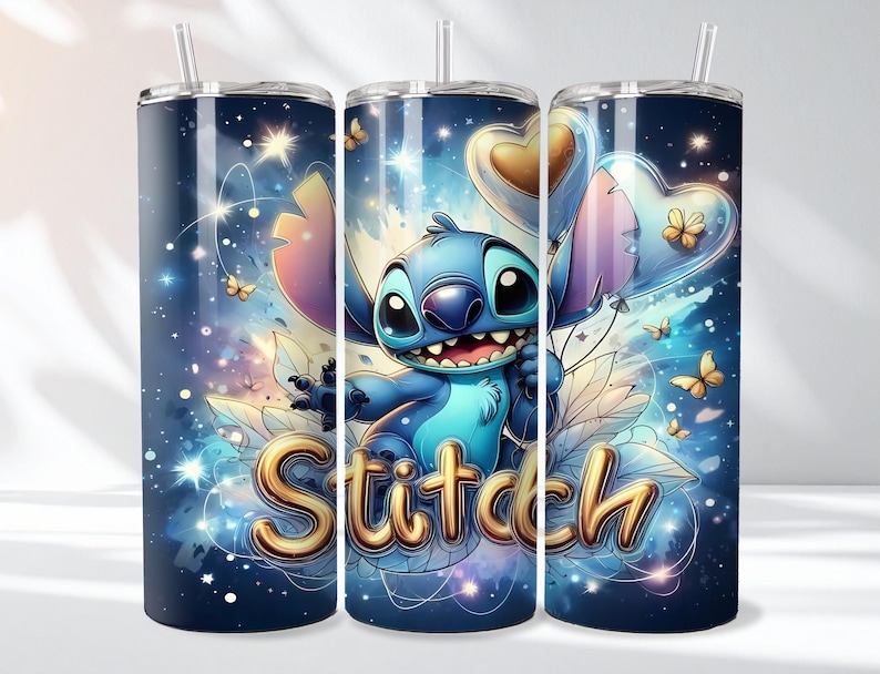 May include: A set of three stainless steel tumblers with a vibrant design featuring the character Stitch from Lilo & Stitch. The design includes Stitch, heart-shaped balloons, butterflies, and the word "Stitch" in gold lettering against a starry blue background.