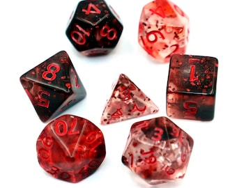May include: A collection of seven multi-sided dice in red and black. Each die has red numerals. These dice are designed for use in tabletop role-playing games.