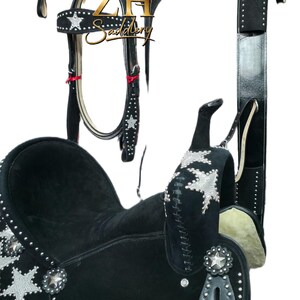 May include: Black horse saddle with silver star accents and studded details. The saddle includes a matching bridle, breast collar, and other accessories. The set is designed for equestrian use.