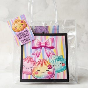 May include: A clear plastic gift bag with transparent handles and a snap closure. Attached is a rectangular tag with pastel stripes, a cartoon dumpling, and the text "Thanks for coming to my party! Olivia." A square card features a pink bow and dumplings.