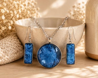 Conjunto de joyas con efecto mármol oceánico, colgante y pendientes de acrílico azul, ganchos de plata de ley.