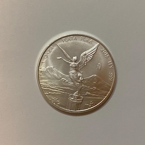 2015   mexico libertad silver coin, one oz, .999, brilliant uncirculated, winged victory,  plata Pura collectible bullion.
