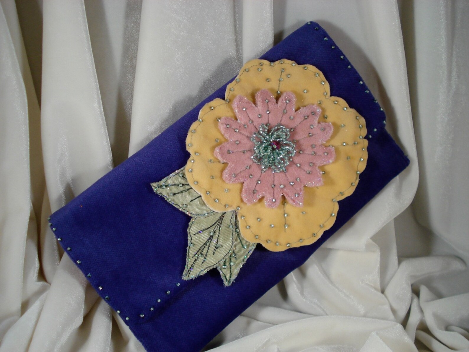 purple velvet clutch bag