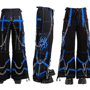 May include: Black cargo trousers with blue detailing, stitching, and straps. Silver chains and blue tribal designs add detail. The trousers have multiple pockets and zips, and are shown from different angles.