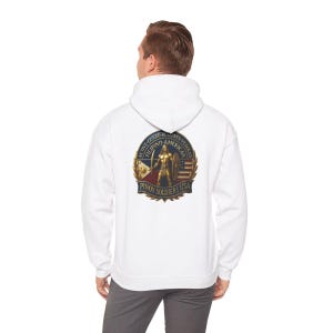 May include: White hooded sweatshirt featuring a circular emblem with a soldier graphic, the text "PINOY SOLDIERS USA", and the words "ACTIVE-GUARD-RESERVE-VETERAN FILIPINO-AMERICAN". The design incorporates the American and Philippine flags.