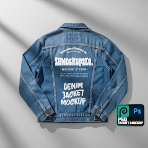 May include: A blue denim jacket mockup with white text on the back that reads "Professional Mockups for Modern Brands" and "SB Mockups Co. Mockup Studio." The words "Denim Jacket Mockup" are also displayed. A "PSD Smart Mockup" logo is in the bottom right corner.
