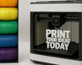 May include: A 3D printer with the text "PRINT YOUR IDEAS TODAY" in white letters. To the left, a rack holds spools of colorful filament in orange, yellow, green, blue, and purple. The printer is black and white.