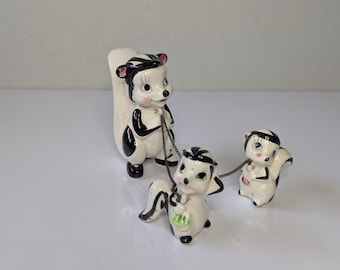 Vintage Kitsche Anthropomorphic Skunk Figurine Family Set