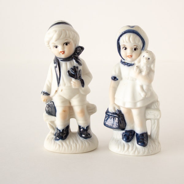 Boy and Girl Porcelain Figurines Bisqueware
