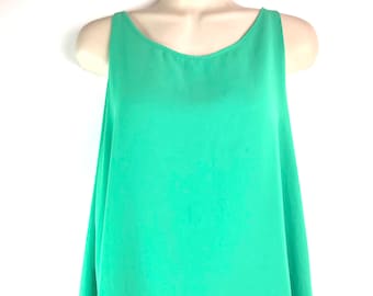 May include: A sleeveless, mint green, layered tank top with a scoop neck.