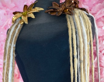 Dread Lock falls in White, with blonde highlights