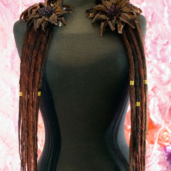 Dreadlock hair falls in Browns and copper