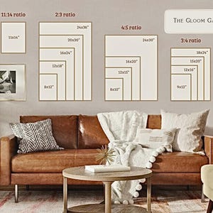 May include: A living room scene with a brown leather sofa, a round wooden coffee table, and framed art prints in various sizes. The prints are displayed in different aspect ratios, including 11x14 inches, 24x36 inches, and 24x30 inches. The text "THE GLOOM GALLERY" is visible.