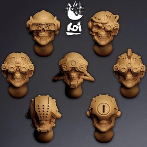 May include: Seven beige skull sculptures, each featuring distinct futuristic headgear designs. The collection includes goggles, visors, and mechanical elements, evoking a cyberpunk or sci-fi aesthetic. The sculptures are presented against a dark grey backdrop.