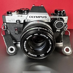 Olympus OM-10 35mm camera with 50mm Zuiko lens VG!