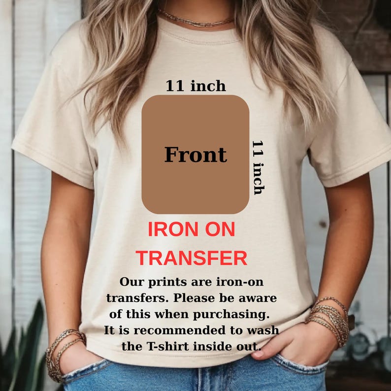 May include: A beige t-shirt with a brown square that is 11 inches wide and tall, labeled "Front". The text "IRON ON TRANSFER" is below the square. The shirt is a heat transfer product.