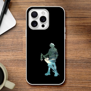 May include: Black phone case with a white border. The case features a silhouette of a person holding a weapon, with a blue and green watercolor effect. The phone case is on a wooden surface.