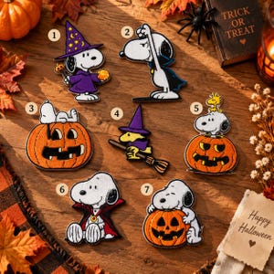 May include: Seven embroidered patches featuring Snoopy and Woodstock in Halloween costumes. Designs include Snoopy as a wizard, a vampire, and sitting on pumpkins, plus Woodstock as a witch on a broomstick. Each patch is numbered one through seven.