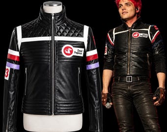May include: A black motorcycle jacket with a stand-up collar, featuring a quilted shoulder pattern, horizontal chest ribbing, and a white stripe across the chest. It includes a circular patch with a horse graphic and the text Dead Pegasus.