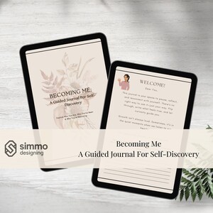 May include: Two black tablets displaying a guided journal titled "Becoming Me: A Guided Journal For Self-Discovery." One tablet shows the cover with floral illustrations, the other displays a welcome message and journal prompts.