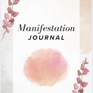 May include: A journal cover with the words "Manifestation JOURNAL" in black script. The background is a watercolor design with a peach-colored blotch and pink and brown eucalyptus branches.
