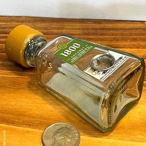 Mini 1800 Tequila Bottle Pipe – handcrafted from an authentic glass mini.  Upcycled, unique, and ready to use.