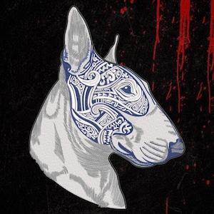 May include: An embroidered patch featuring the profile of a Bull Terrier dog. The design is rendered in white and blue thread, with intricate tribal-style patterns covering the upper portion of the head and ear against a black background.