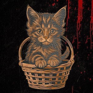 May include: A graphic illustration of a brown tabby kitten sitting inside a woven wicker basket. The kitten has large eyes and pointed ears, rendered in orange and black lines against a dark background with red paint-like splatters.