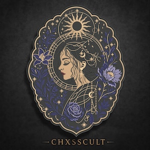 May include: An oval-shaped decorative plaque featuring a profile illustration of a person surrounded by purple flowers, stars, a sun, and crescent moons. The design uses gold lines on a black background with the text CHXSSCULT at the bottom.