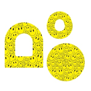 Puede incluir: Tres formas amarillas con un patrón repetido de caras sonrientes. Las formas incluyen un arco redondeado, un círculo con un agujero en el medio y un círculo sólido. Las caras sonrientes son negras sobre un fondo amarillo.
