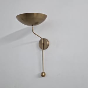 Modern Minimalist Brass Sconce – Uplight Wall Lamp with Pendulum Detail