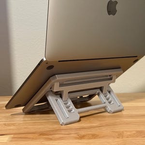 Foldable Adjustable Laptop Stand – Ergonomic Portable Riser