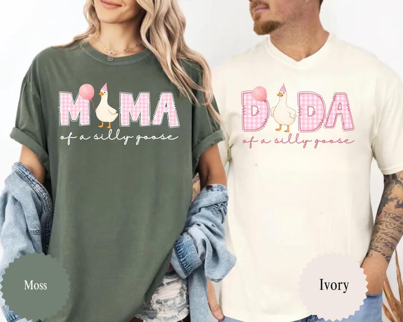 May include: Two t-shirts, one moss green and one ivory, featuring the text "MAMA of a silly goose" and "DADA of a silly goose" in pink plaid letters. Each shirt has a cartoon goose wearing a party hat and holding a pink balloon.