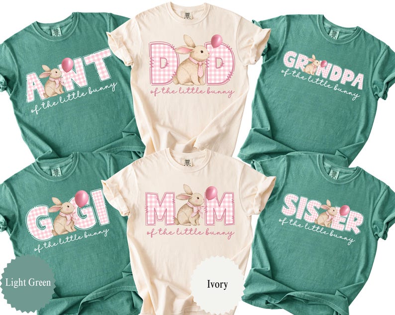 May include: A collection of light green and ivory t-shirts with Easter-themed graphics. Each shirt features a bunny illustration, a pink balloon, and text such as "Aunt", "Dad", "Grandpa", "Mom", and "Sister" in a playful font.