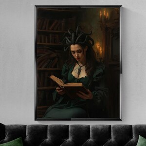 Dark academia fantasy wall art featuring a Medusa-inspired sorceress with serpent hair reading an ancient book inside a candlelit gothic library, surrounded by shelves of old tomes and warm shadows.
