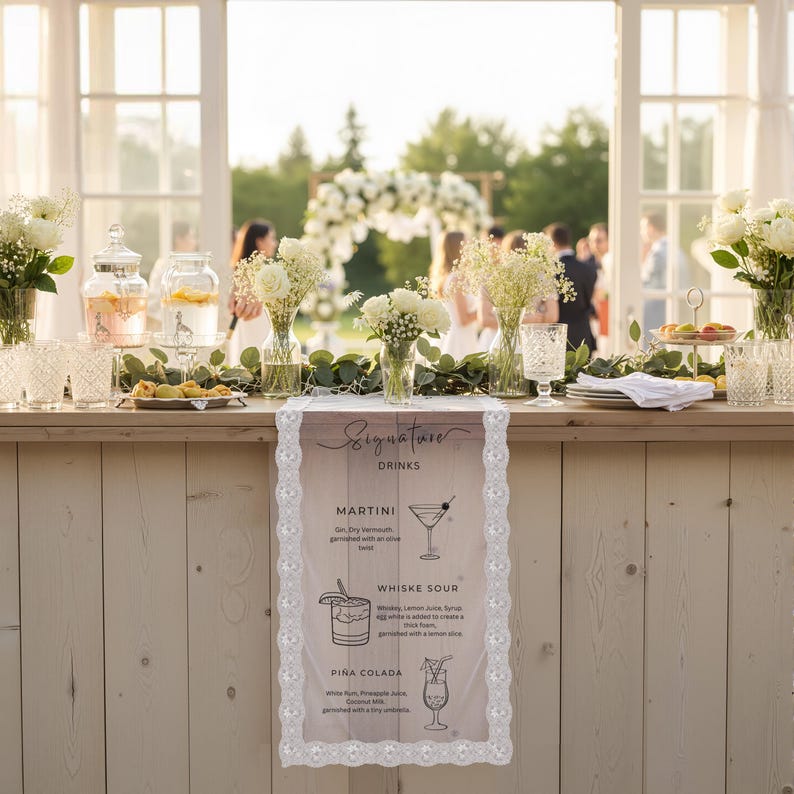 May include: A rectangular table runner with a white lace border featuring a printed menu titled Signature Drinks. The text lists Martini, Whiskey Sour, and Pi&ntilde;a Colada with corresponding line art illustrations of each cocktail glass on a light background.