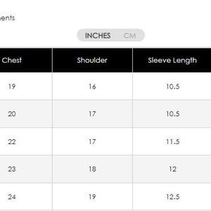 May include: A body measurements chart in a table format. The chart includes sizes XS to XL, with chest measurements from 48 to 61 cm, shoulder measurements from 41 to 48 cm, sleeve lengths from 27 to 32 cm, and shirt lengths from 51 to 56 cm.