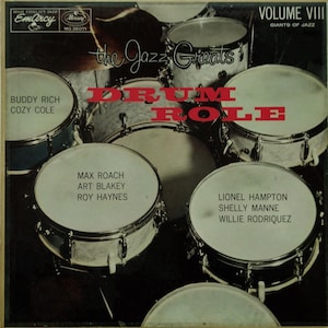 May include: Vintage vinyl record album cover titled "Drum Role" featuring a collection of jazz drummers. The cover displays several drum sets and the names of the artists: Buddy Rich, Cozy Cole, Max Roach, Art Blakey, Roy Haynes, Lionel Hampton, Shelly Manne, and Willie Rodriguez.