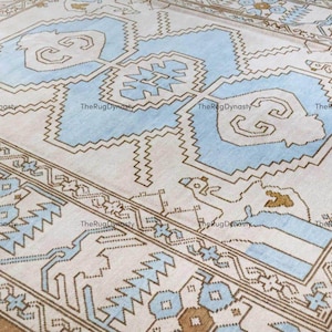 Hand-Knotted Sky Blue Wool Rug: Modern Oushak Design
