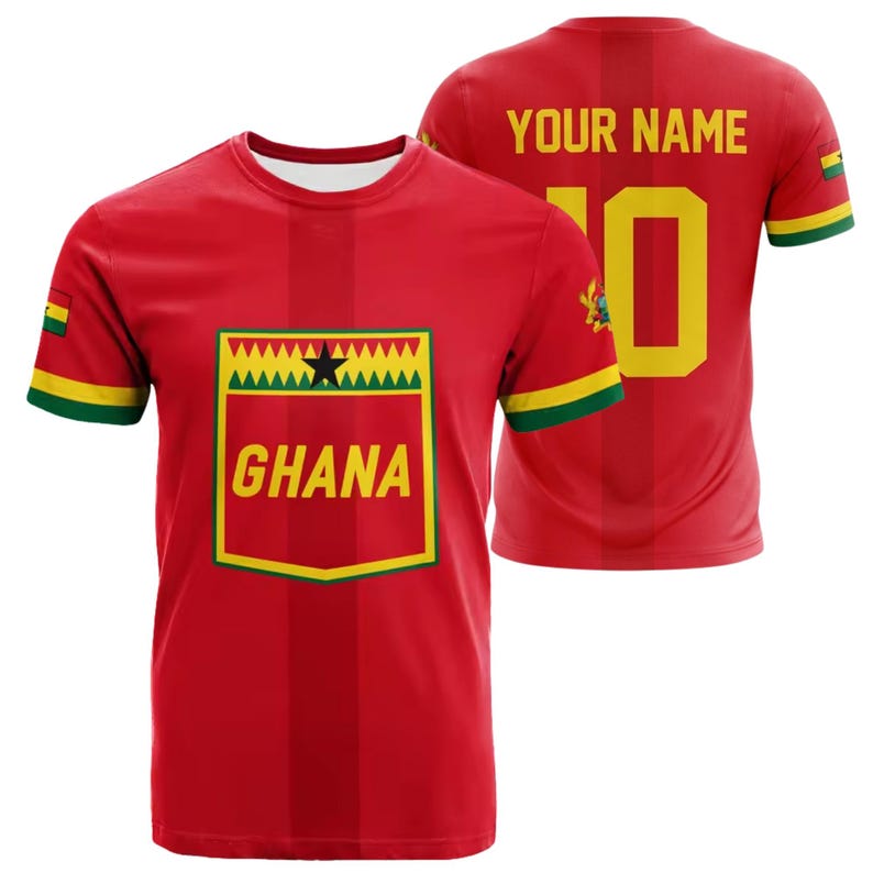 May include: Red t-shirt with yellow and green accents, featuring the word "GHANA" in a yellow rectangle with a black star. The back of the shirt displays "YOUR NAME" above a yellow number "10".