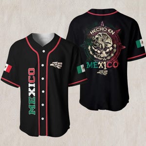 May include: Black baseball jersey with red trim and the word "MEXICO" in green and red vertical text. Features the Mexican flag on the sleeve and a white eagle logo. The back displays "HECHO EN MEXICO" and a Mexican emblem.