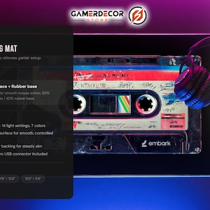 May include: LED gaming mat with RGB lighting, featuring a retro cassette tape design. The mat has a polyester surface and rubber base, with a non-slip backing. Available in multiple sizes, including 23.6" x 11.8" and 35.4" x 15.7".