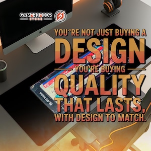 May include: A black gaming mouse pad with a colorful design and the text "YOU'RE NOT JUST BUYING A DESIGN, YOU'RE BUYING QUALITY THAT LASTS, WITH DESIGN TO MATCH." A computer monitor, headphones, and a desk chair are also visible.