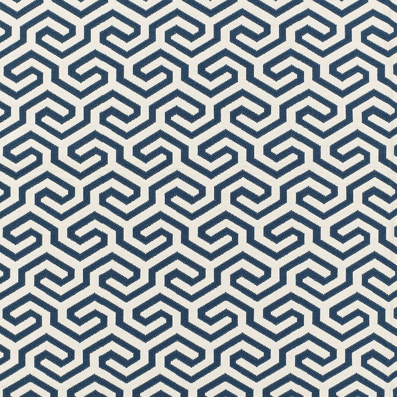 May include: A seamless pattern with a geometric design. The pattern is made up of interlocking shapes in a dark blue color on a white background.