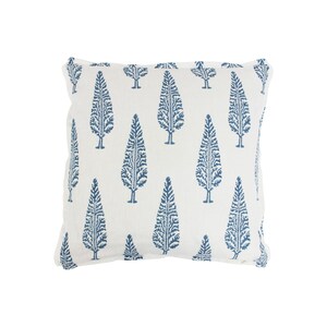 May include: A white throw pillow with a blue tree pattern. The pillow has a white border and a subtle texture.