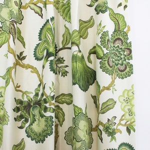 May include: Green floral patterned fabric with a white background. The fabric has a traditional design with large flowers and leaves.