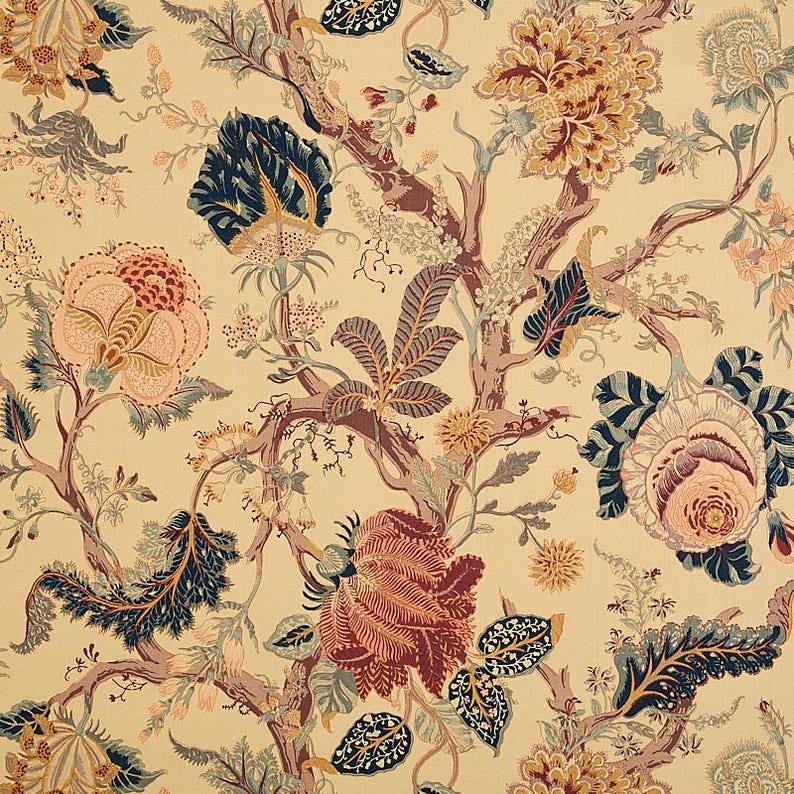 May include: A beige fabric with a repeating pattern of stylized flowers and leaves in shades of pink, red, blue, and green.