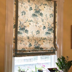 Lee Jofa Althea Cotton Chintz Custom Roman Shade in Living Room (shown in Citron) Citron Linen