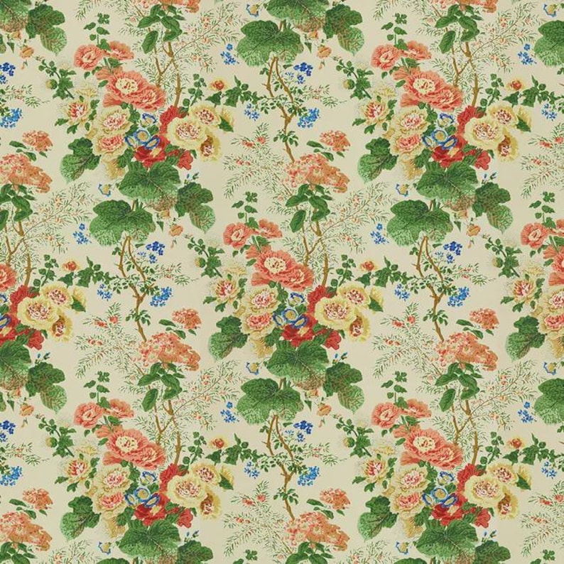 May include: Floral fabric featuring a repeating pattern of large, stylized flowers in shades of peach, yellow, red, and blue. Green leaves and delicate white sprigs fill the spaces between the blooms, all set against a cream background.